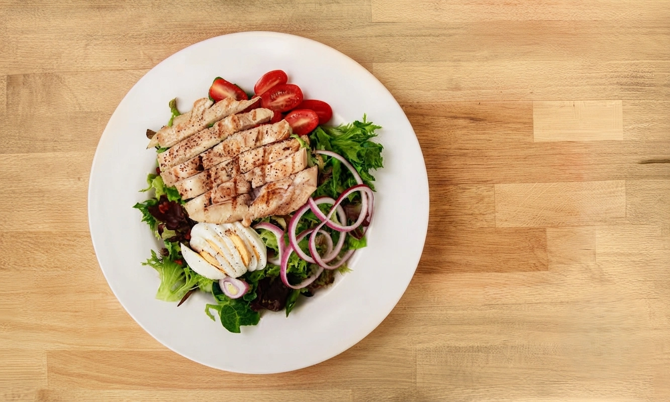Grilled chicken honey mustard salad at Fresh Grill Kitchen Stony Plain - fresh greens topped with grilled chicken