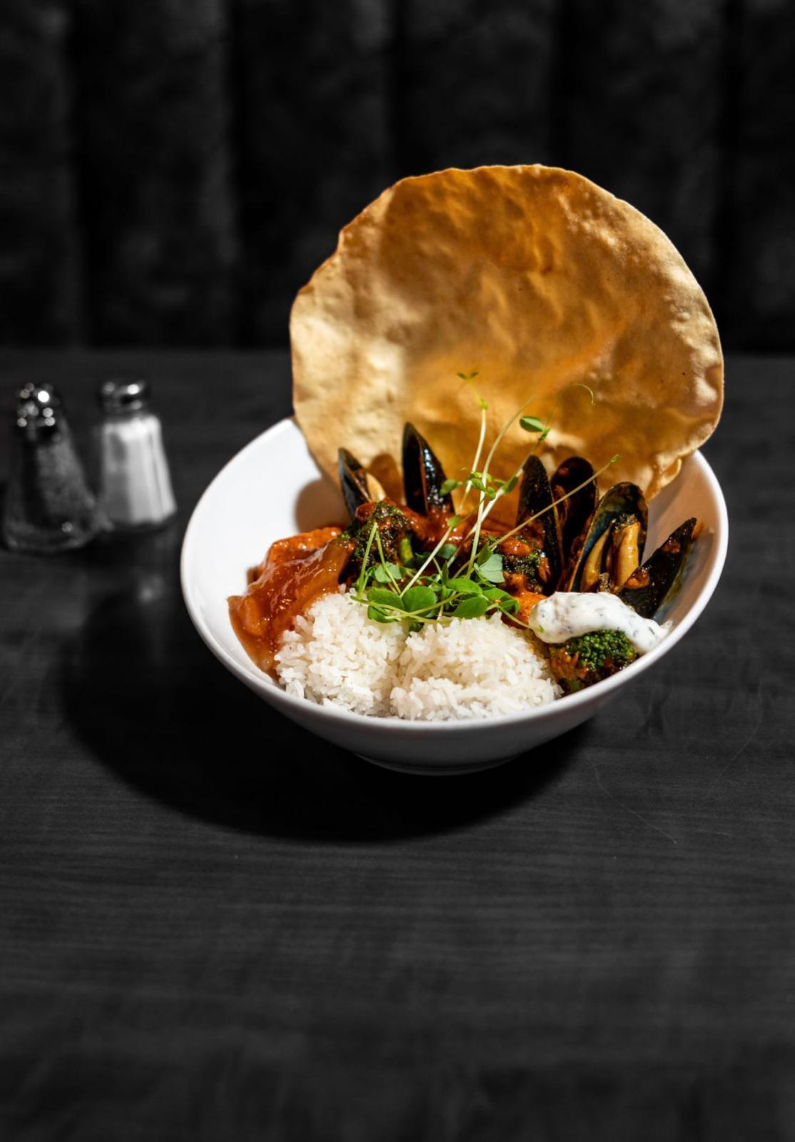 Ceylon seafood curry with mussels, shrimp and salmon over jasmine rice at Fresh Grill Kitchen in Stony Plain, Alberta